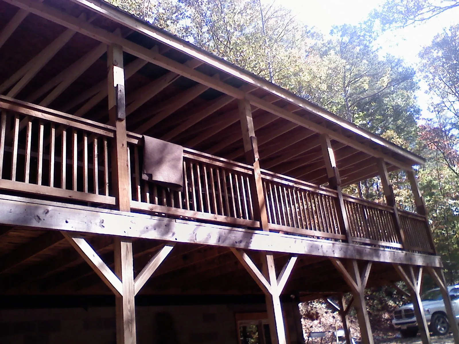 Timber framing under a new elevated porch and deck — Roof Leak Repair in Browerville by Roofing Brothers